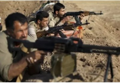 Trampın ziddiyyətli bəyanatları: Kürdlər silah iddialarını təkzib edir